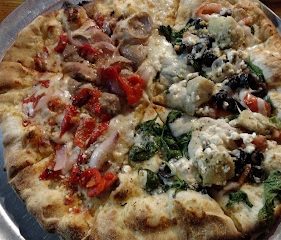 The Rolling Tomato Pizzeria