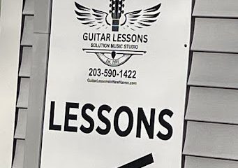 Guitar Lessons at Solution Music Studio