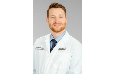 John Huston, MD