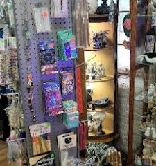 Eye Of The Dragon (Jewett City College Mart Flea Market) located on the 1st floor across from the snack bar
