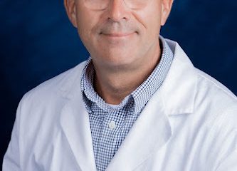 Dennis M. Mello, MD